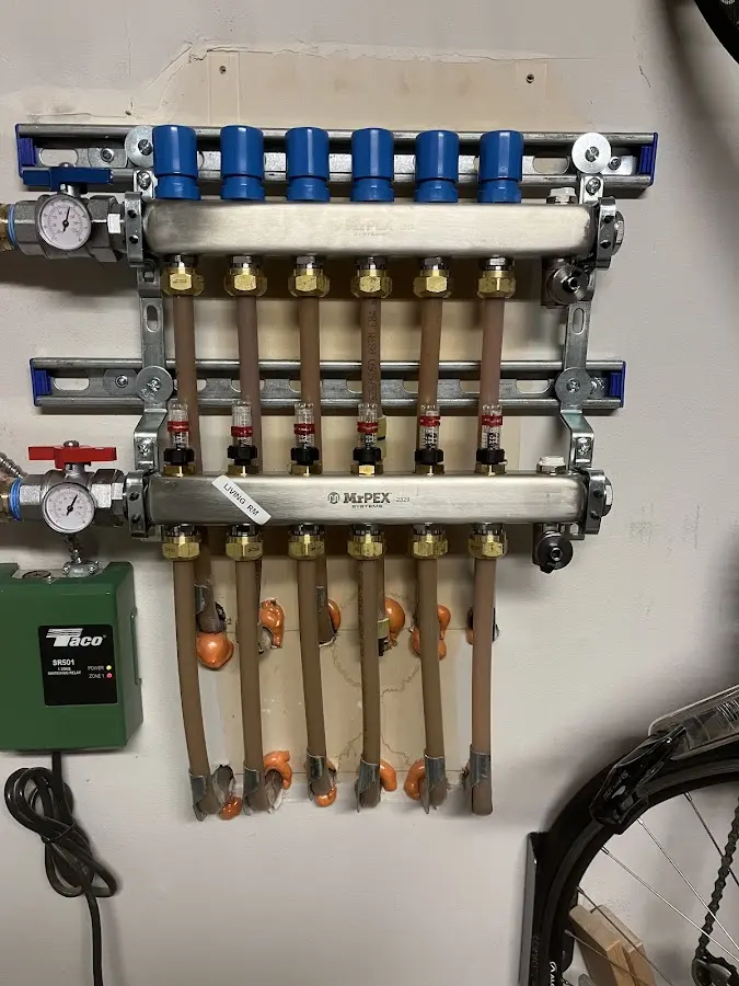 Plumber performing Water Heater Repair at a residential property in Denison